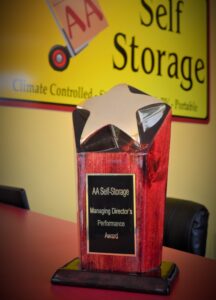 Managing Director’s Performance Award trophy for AA Self Storage displayed in the Jacksonville NC facility