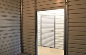 climate controlled storage unit with white roll-up door at AA Self Storage in Jacksonville NC